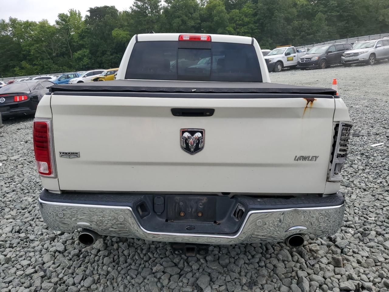 2017 Ram 1500 Laramie VIN: 1C6RR6NT0HS799028 Lot: 63305504