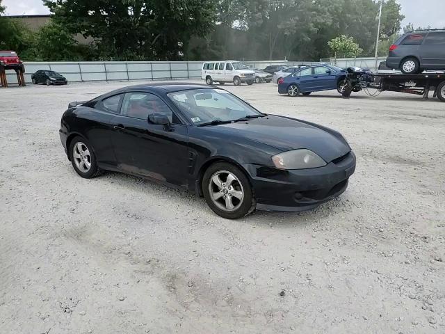 2005 Hyundai Tiburon VIN: KMHHM65D15U184592 Lot: 62537064