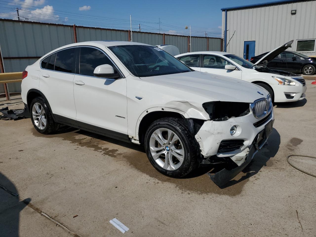 2015 BMW X4 xDrive28I VIN: 5UXXW3C50F0M88167 Lot: 63561234