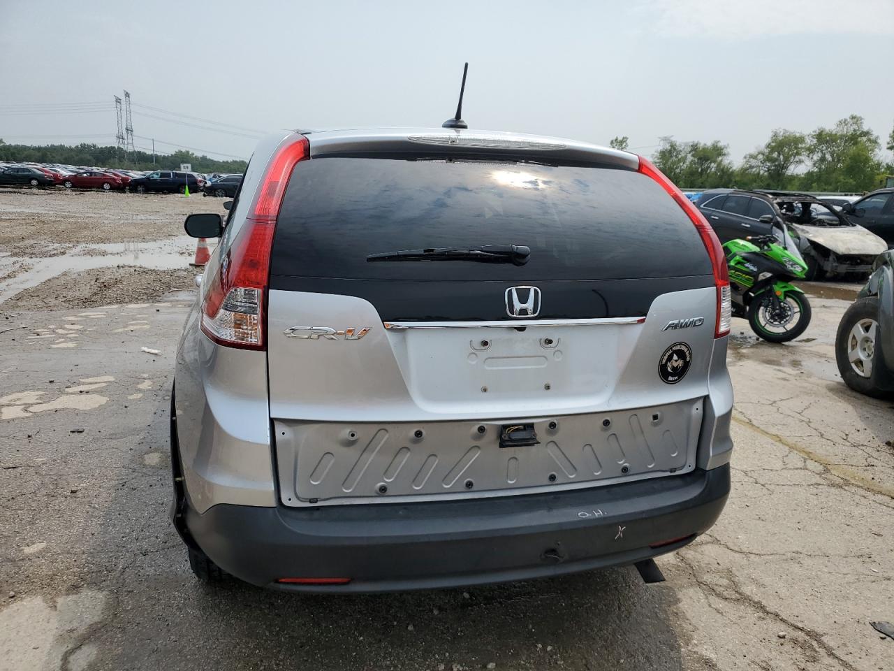 2012 Honda Cr-V Exl VIN: JHLRM4H7XCC021318 Lot: 64463144