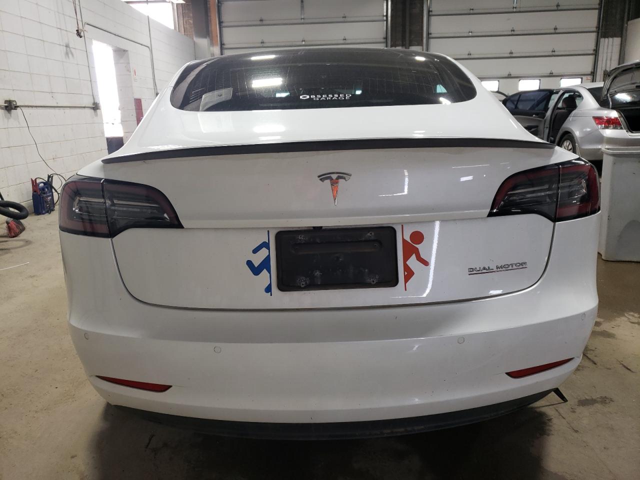 2019 Tesla Model 3 VIN: 5YJ3E1EB1KF393252 Lot: 63906484