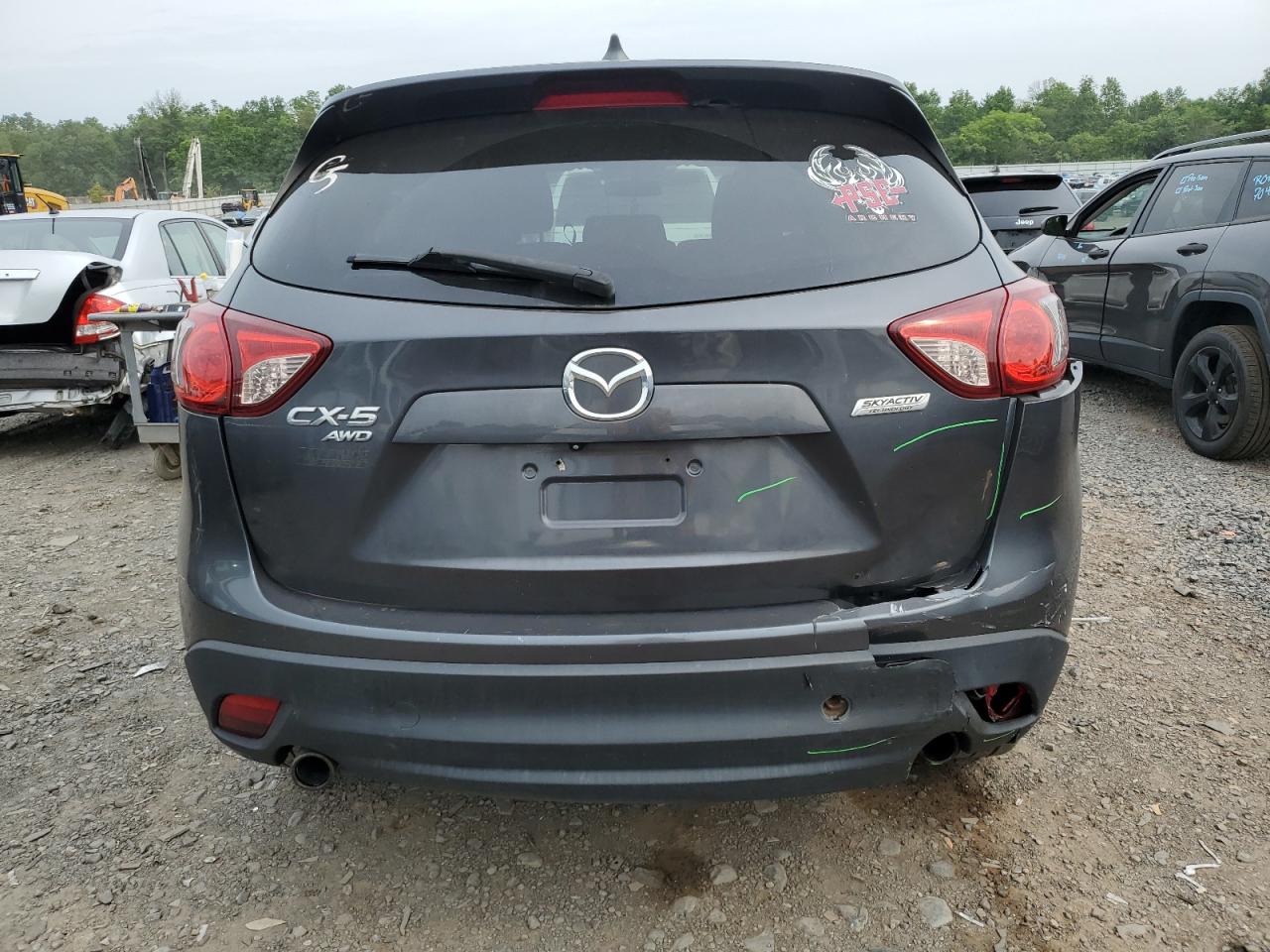 2015 Mazda Cx-5 Touring VIN: JM3KE4CY3F0432729 Lot: 63489474