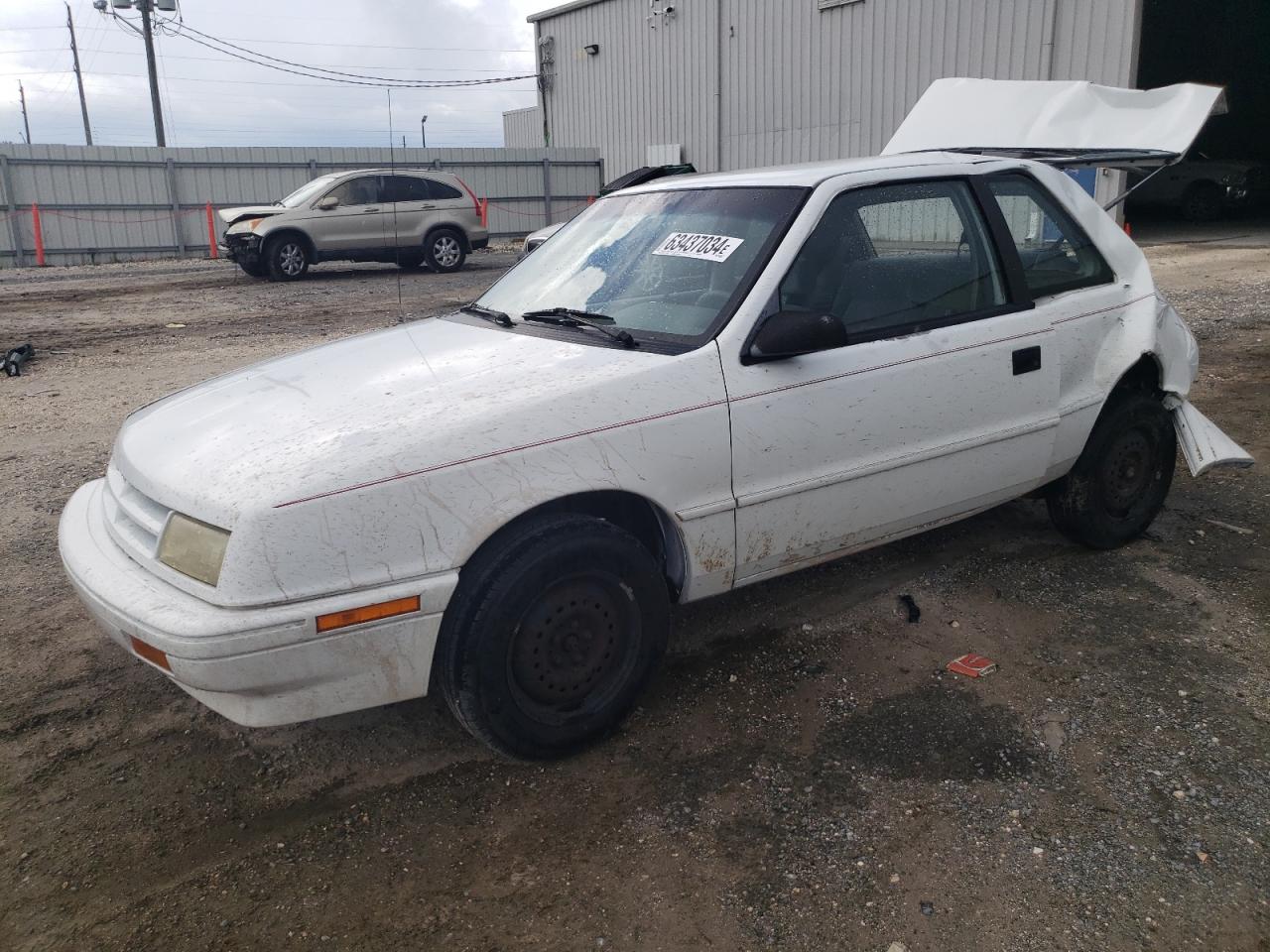 1B3AP24K3RN185413 DODGE SHADOW Photo 1
