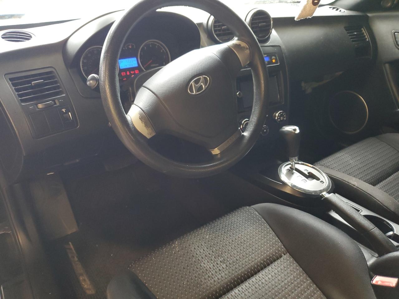 2008 Hyundai Tiburon Gs VIN: KMHHM66DX8U295595 Lot: 58099204