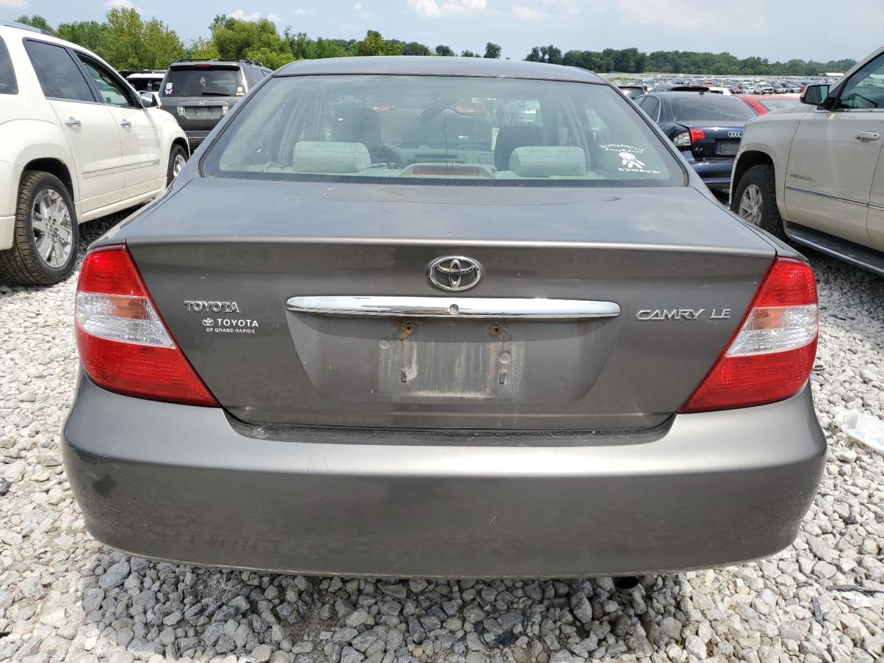 2003 Toyota Camry Le VIN: 4T1BE32K83U689871 Lot: 63990124