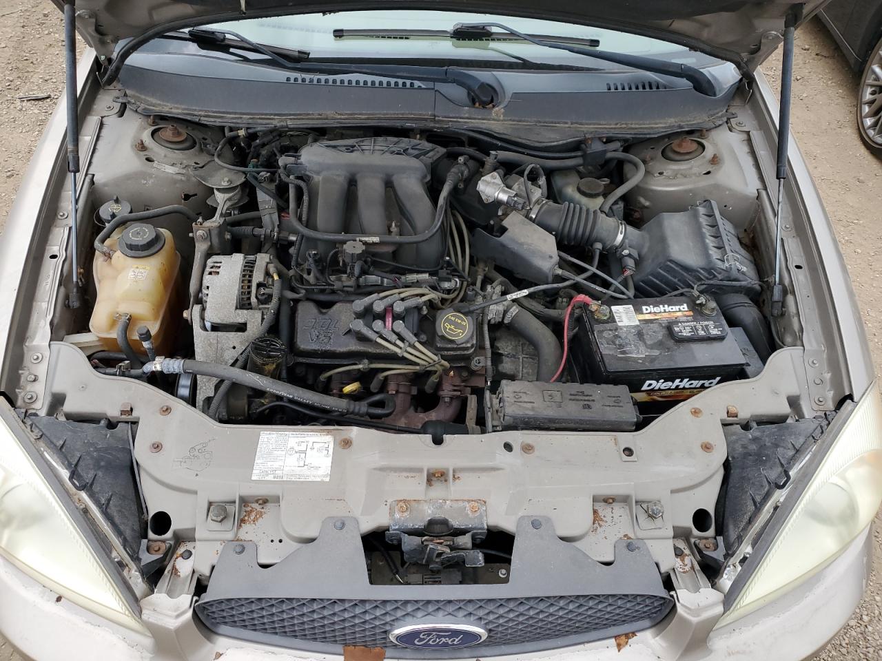 2004 Ford Taurus Se VIN: 1FAFP53U74G143581 Lot: 64410414