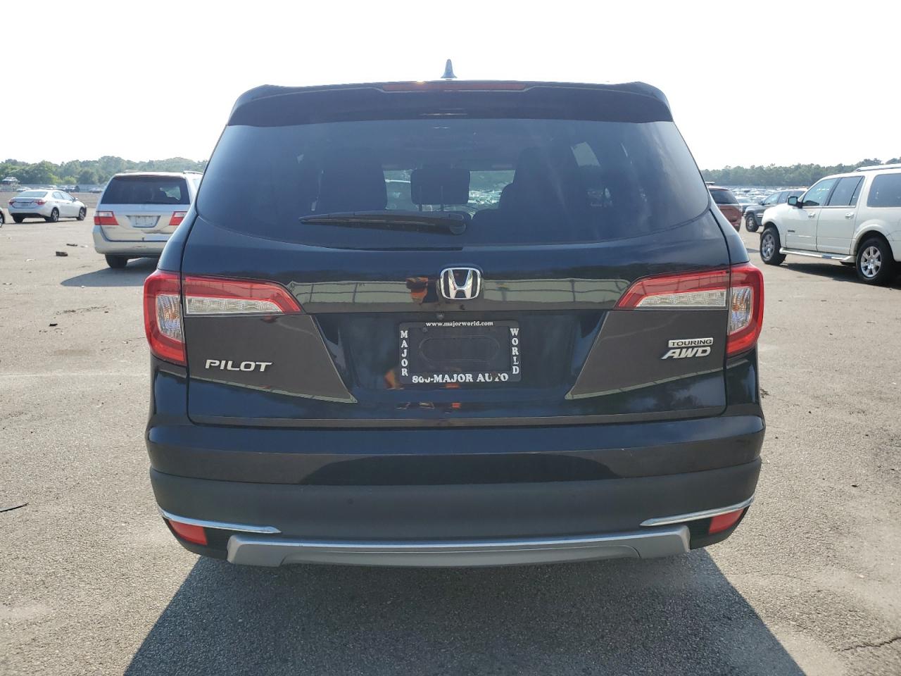 2019 Honda Pilot Touring VIN: 5FNYF6H60KB021240 Lot: 63029944