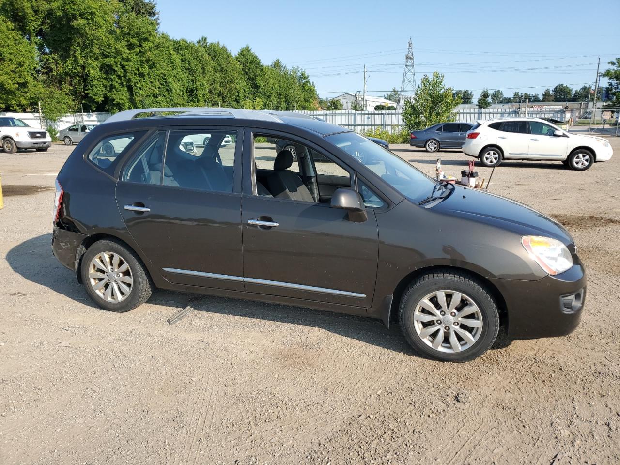 2011 Kia Rondo VIN: KNAHH8C61B7332725 Lot: 65012774