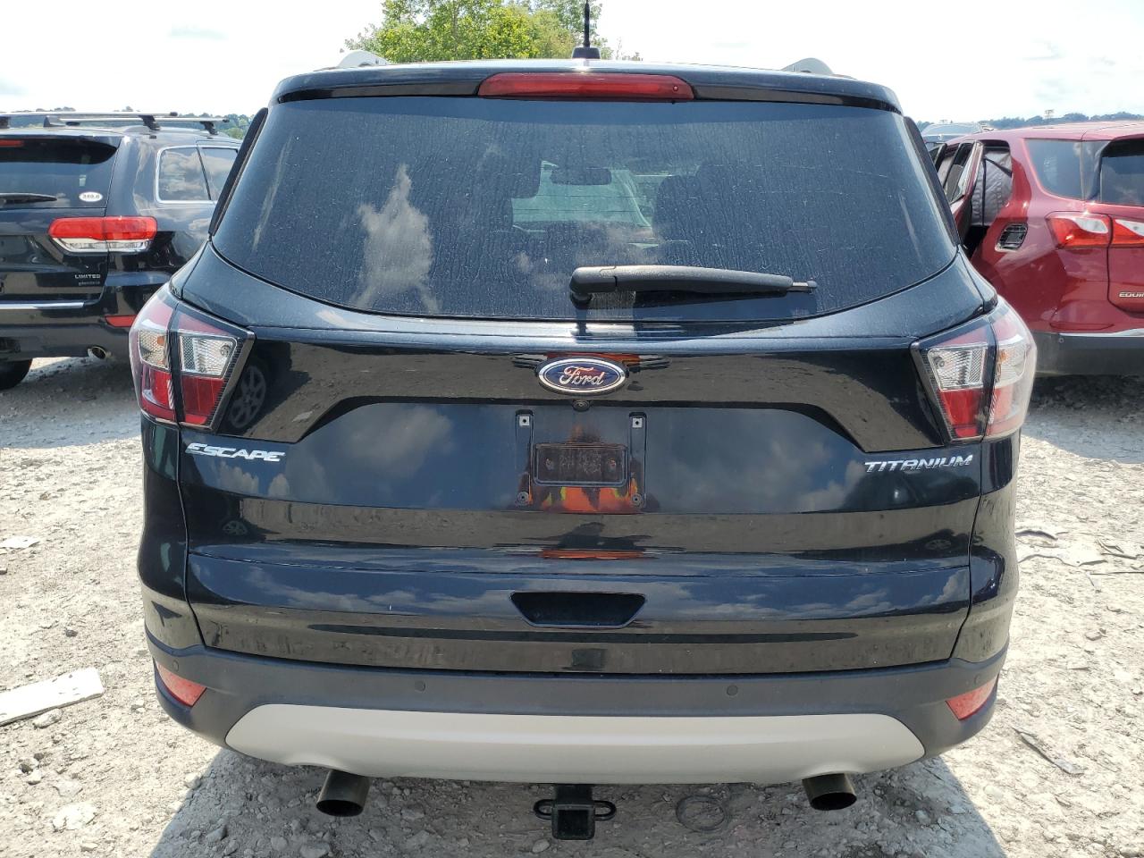 2017 Ford Escape Titanium VIN: 1FMCU9J97HUD66279 Lot: 63852014