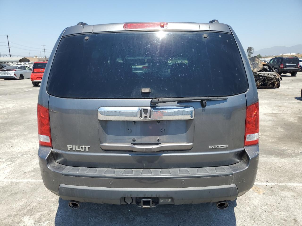 2010 Honda Pilot Touring VIN: 5FNYF3H90AB007443 Lot: 63297424