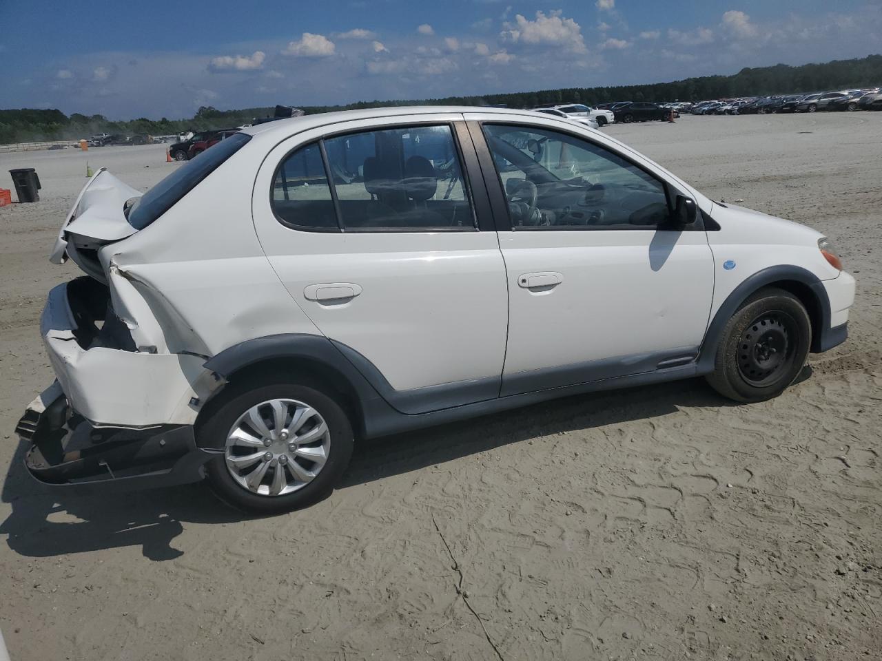 2001 Toyota Echo VIN: JTDBT123310174188 Lot: 62298234