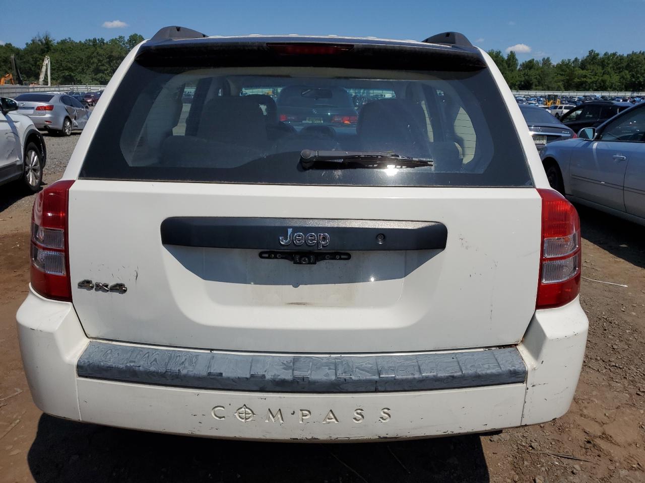 2009 Jeep Compass Sport VIN: 1J4FF47B99D102114 Lot: 63166624