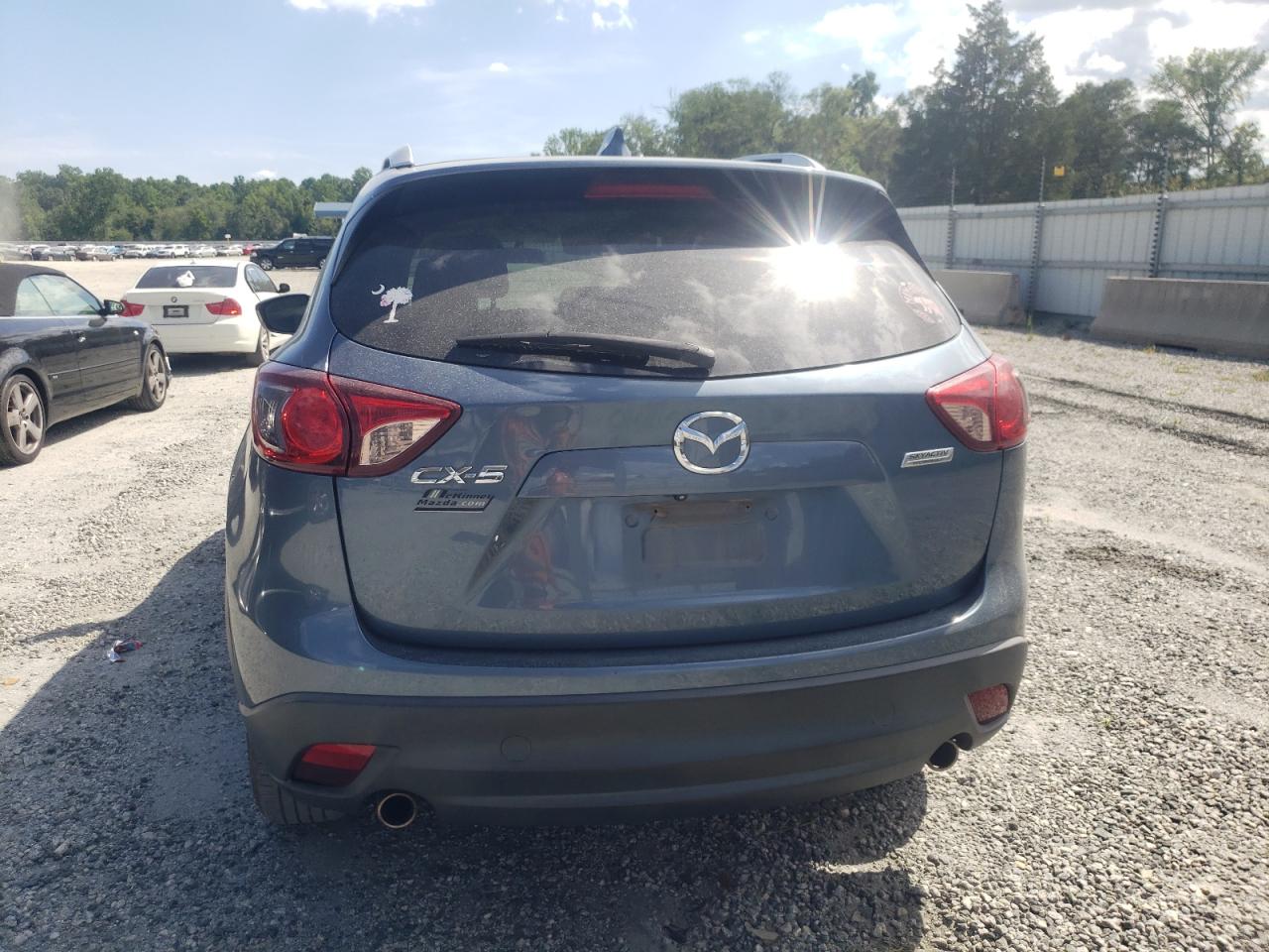2014 Mazda Cx-5 Touring VIN: JM3KE2CY9E0397908 Lot: 62738774