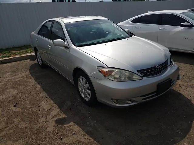 2003 Toyota Camry Le VIN: 4T1BE32K13U250432 Lot: 63604574