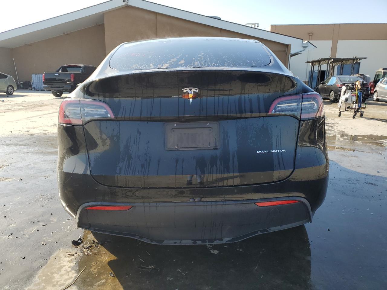 2023 Tesla Model Y VIN: 7SAYGDEE2PF619708 Lot: 64184854
