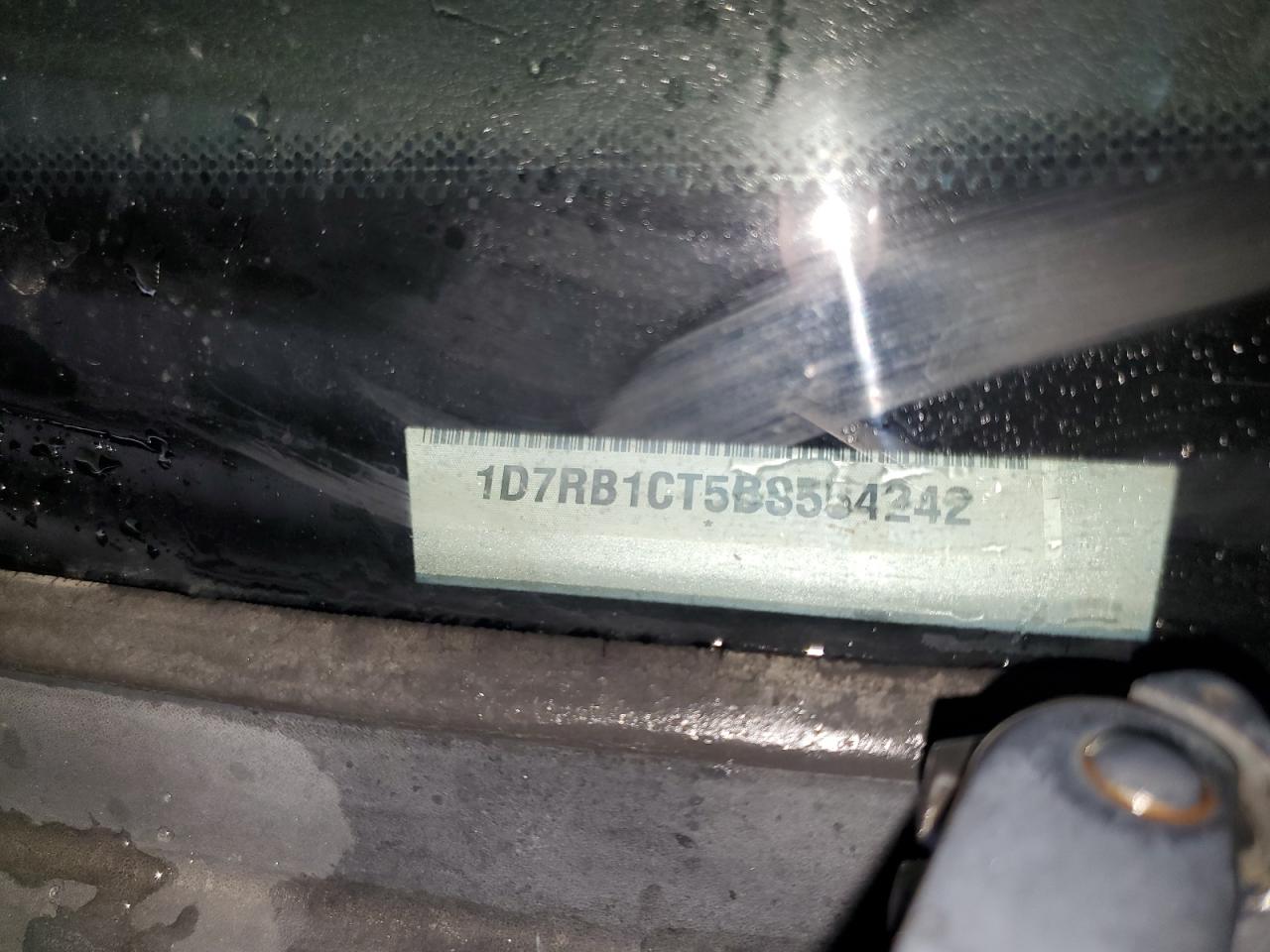 2011 Dodge Ram 1500 VIN: 1D7RB1CT5BS554242 Lot: 64586894