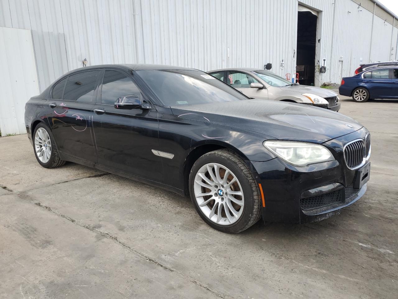 2014 BMW 750 Lxi VIN: WBAYF8C5XED142635 Lot: 63329104