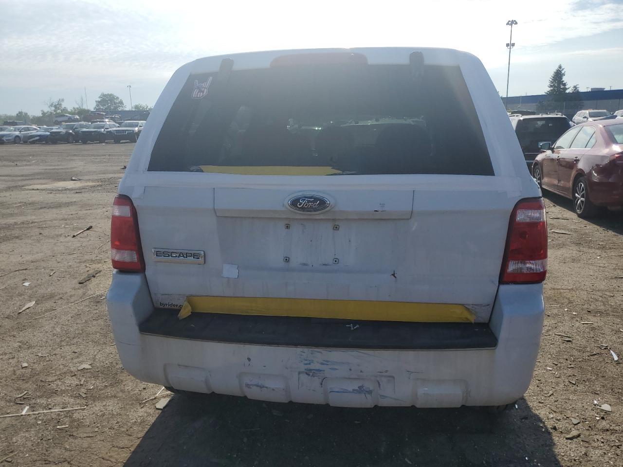 2009 Ford Escape Xls VIN: 1FMCU027X9KA99354 Lot: 61675164