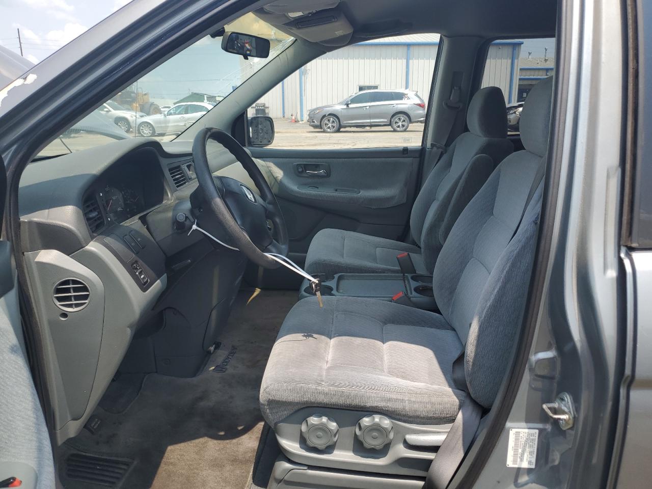 2002 Honda Odyssey Lx VIN: 5FNRL185X2B033208 Lot: 64116444