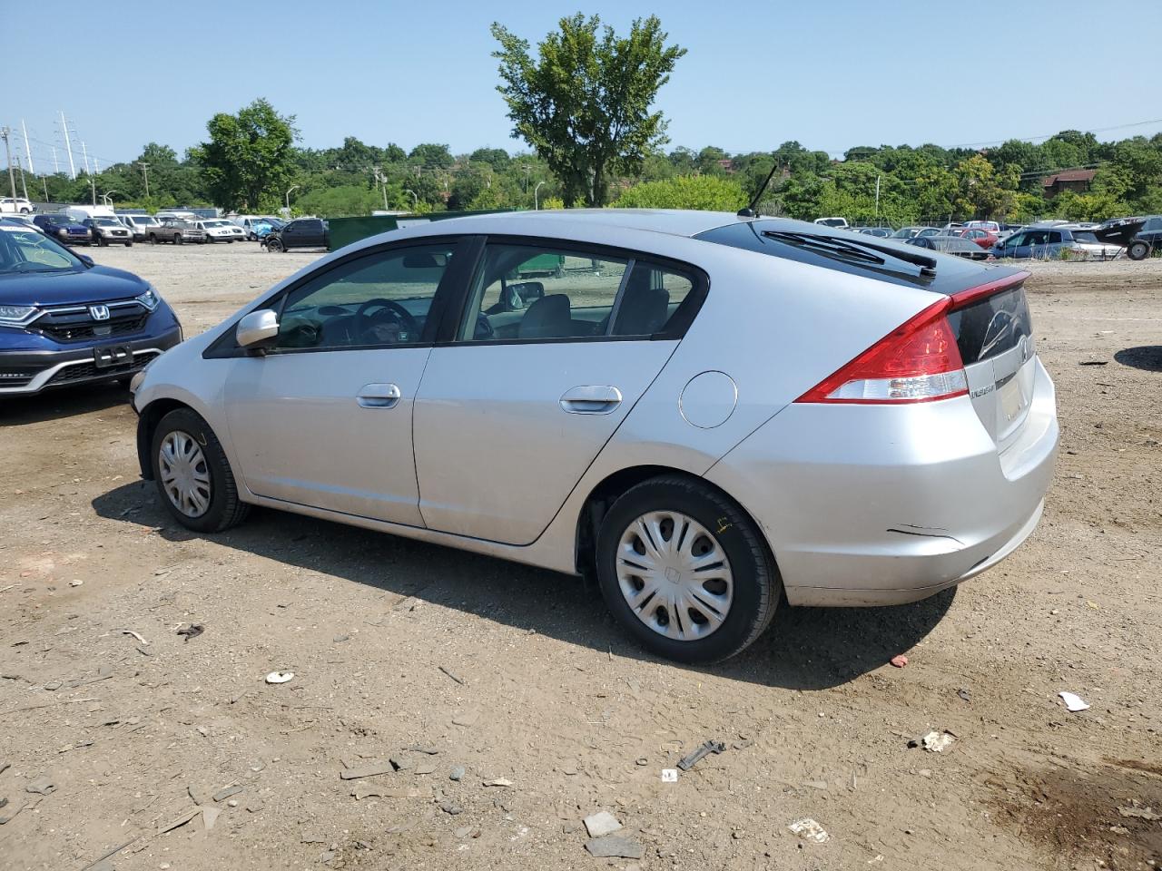 2011 Honda Insight Lx VIN: JHMZE2H5XBS011534 Lot: 69874584