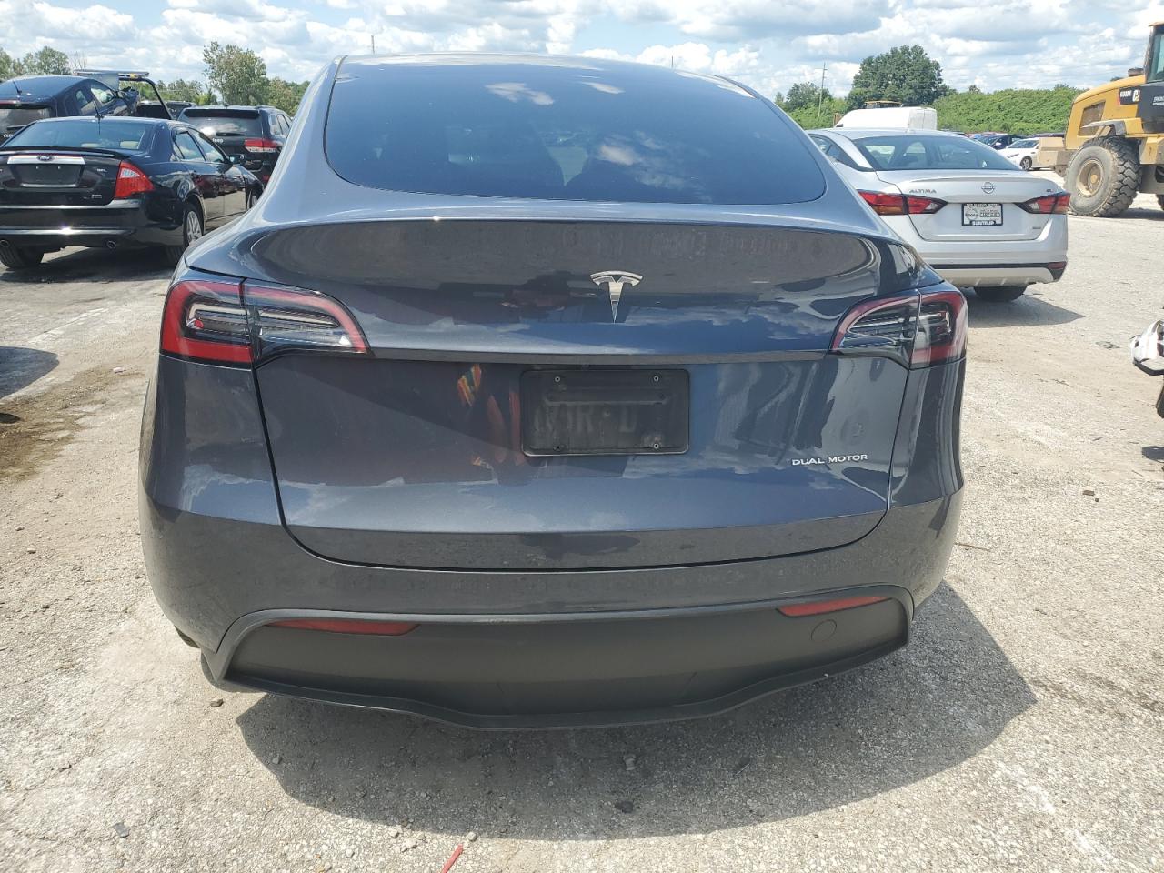 2023 Tesla Model Y VIN: 7SAYGDEE0PA099280 Lot: 63932044