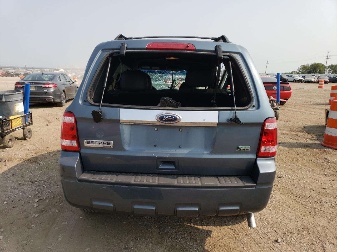 2011 Ford Escape Limited VIN: 1FMCU0EG1BKA09591 Lot: 64472034