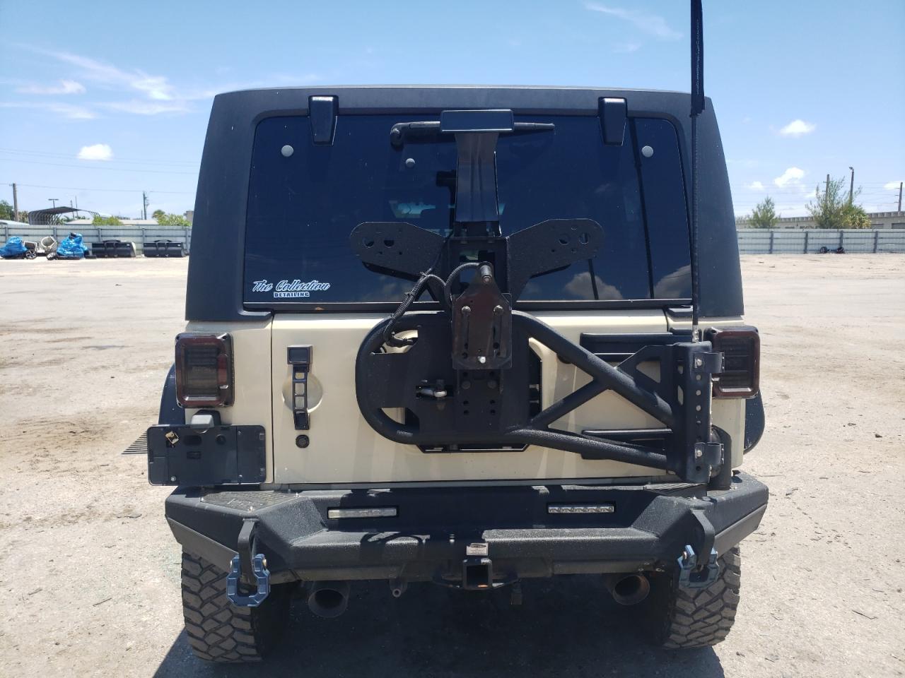2011 Jeep Wrangler Rubicon VIN: 1J4BA6D12BL596168 Lot: 65176814