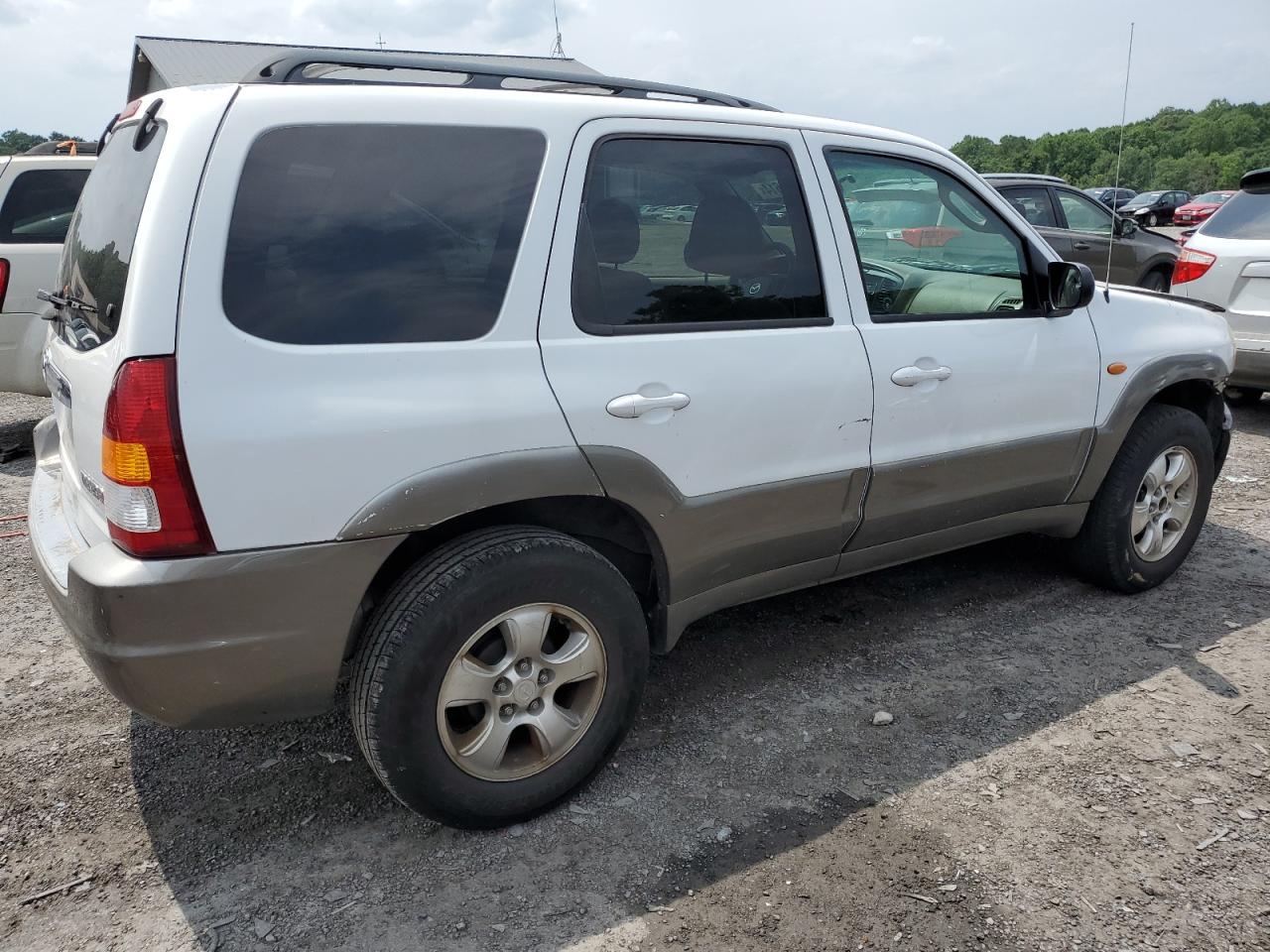 2002 Mazda Tribute Lx VIN: 4F2YU09142KM12464 Lot: 64218614