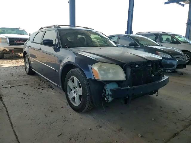 2005 Dodge Magnum Sxt VIN: 2D4FV48V55H670748 Lot: 65326704