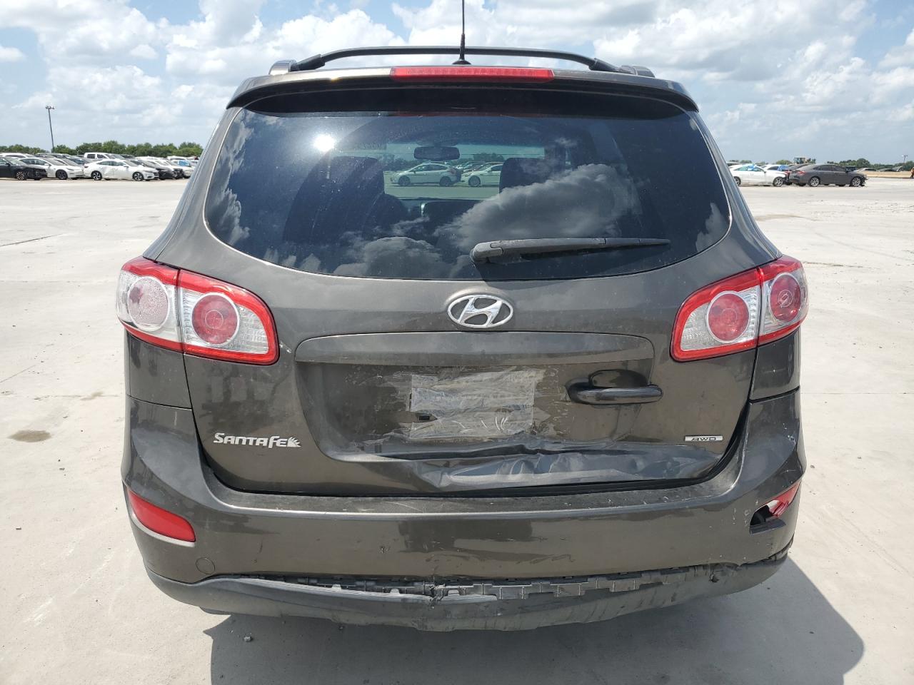 2012 Hyundai Santa Fe Se VIN: 5XYZHDAG2CG120223 Lot: 63276544