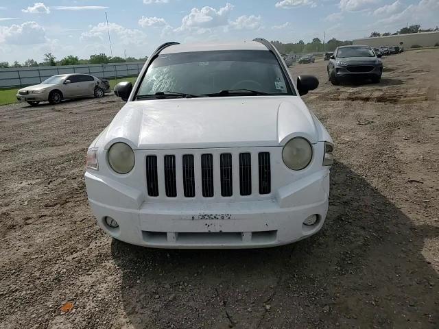 2007 Jeep Compass VIN: 1J8FF47W67D581980 Lot: 62080824