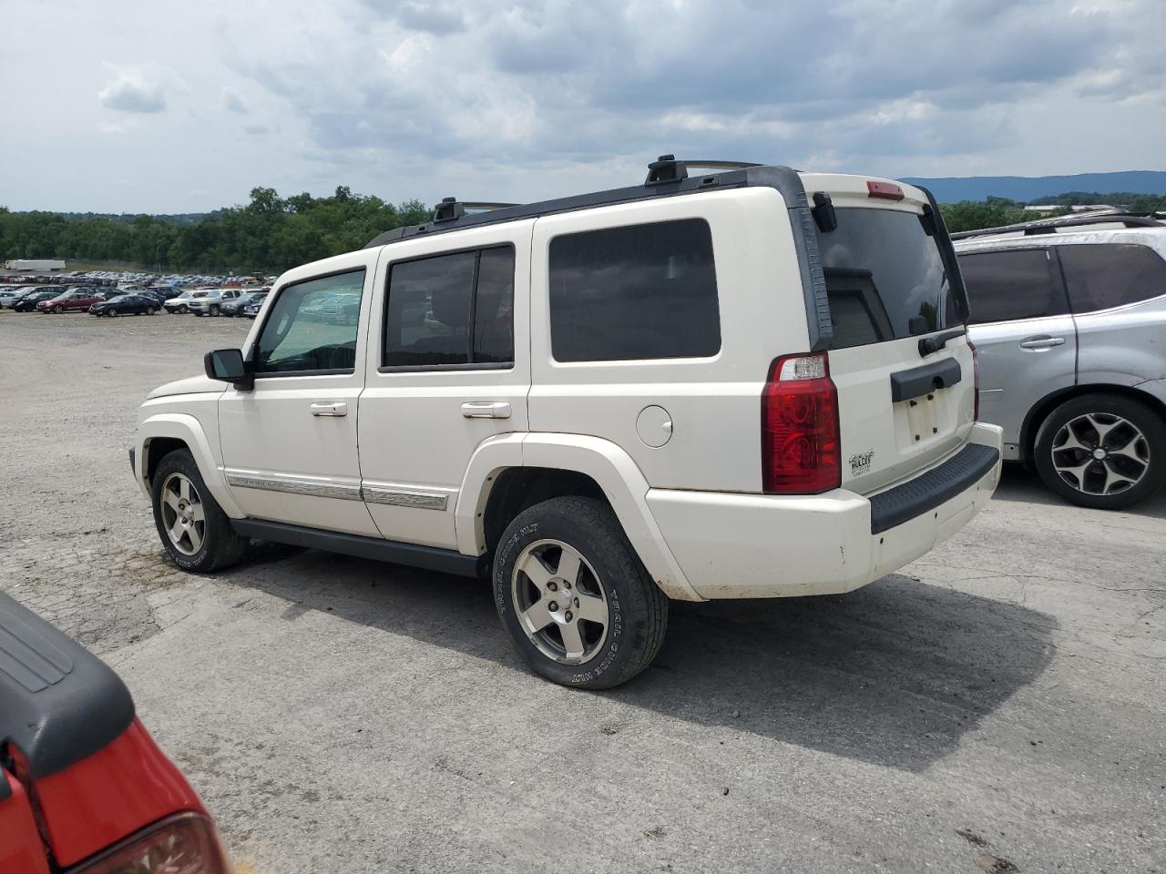 2010 Jeep Commander Sport VIN: 1J4RG4GK9AC131567 Lot: 63239704