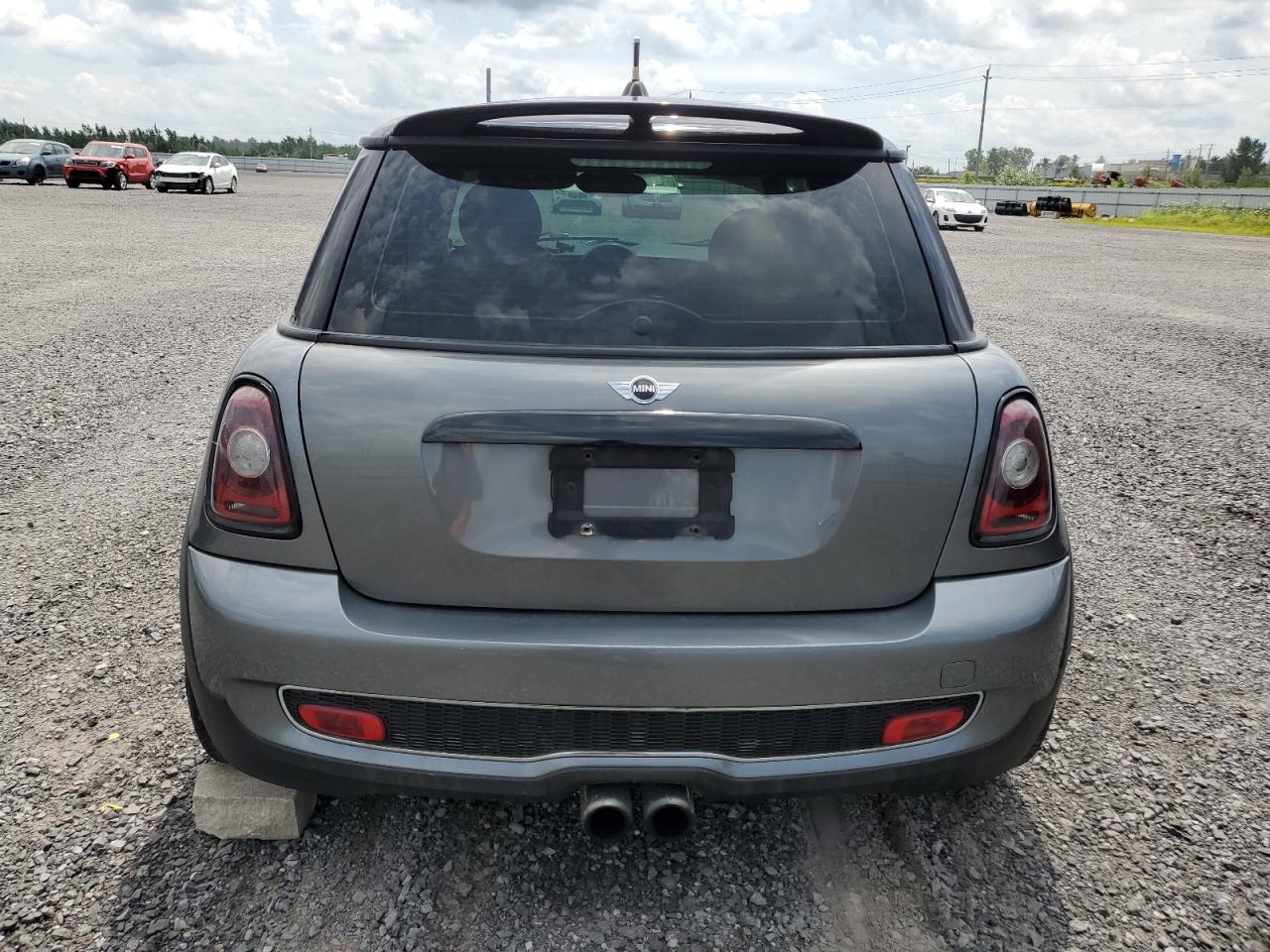 2009 Mini Cooper S VIN: WMWMF73539TX40702 Lot: 63195364