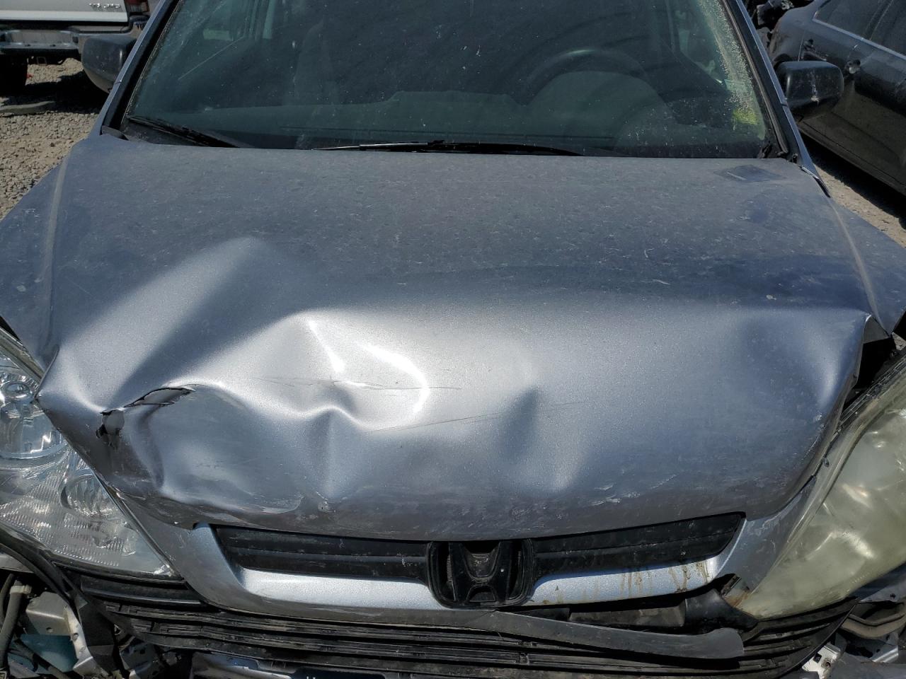 2007 Honda Cr-V Lx VIN: 5J6RE48397L002721 Lot: 62943174