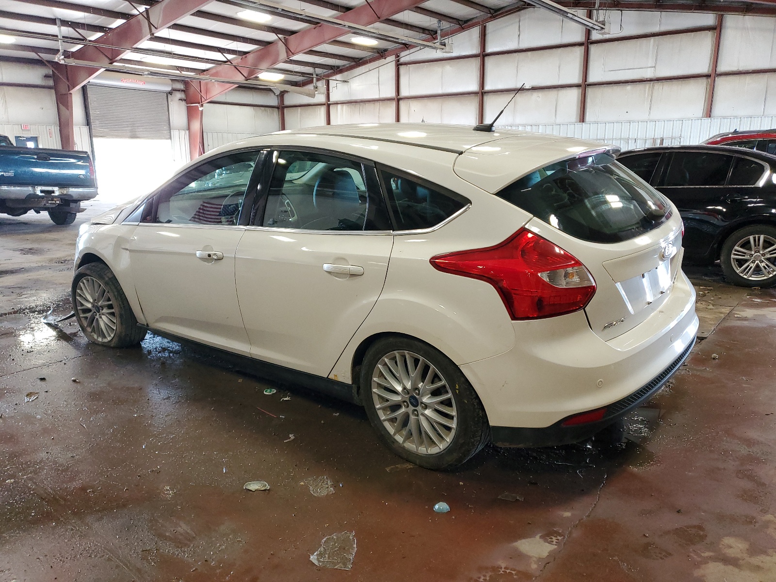 2014 Ford Focus Titanium vin: 1FADP3N24EL194598