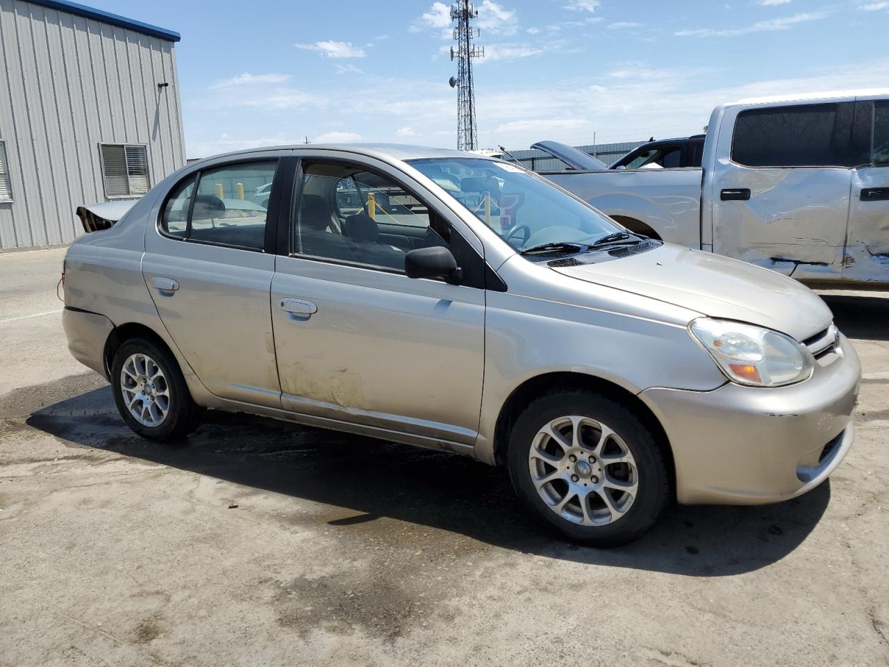 2003 Toyota Echo VIN: JTDBT123530260136 Lot: 63864714