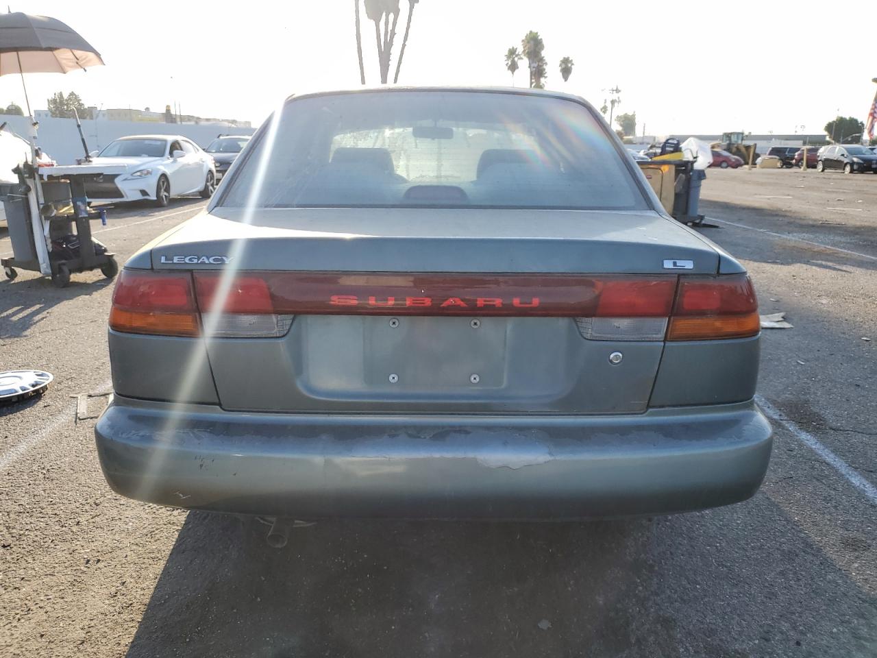 1995 Subaru Legacy L VIN: 4S3BD6353S9213630 Lot: 64120264