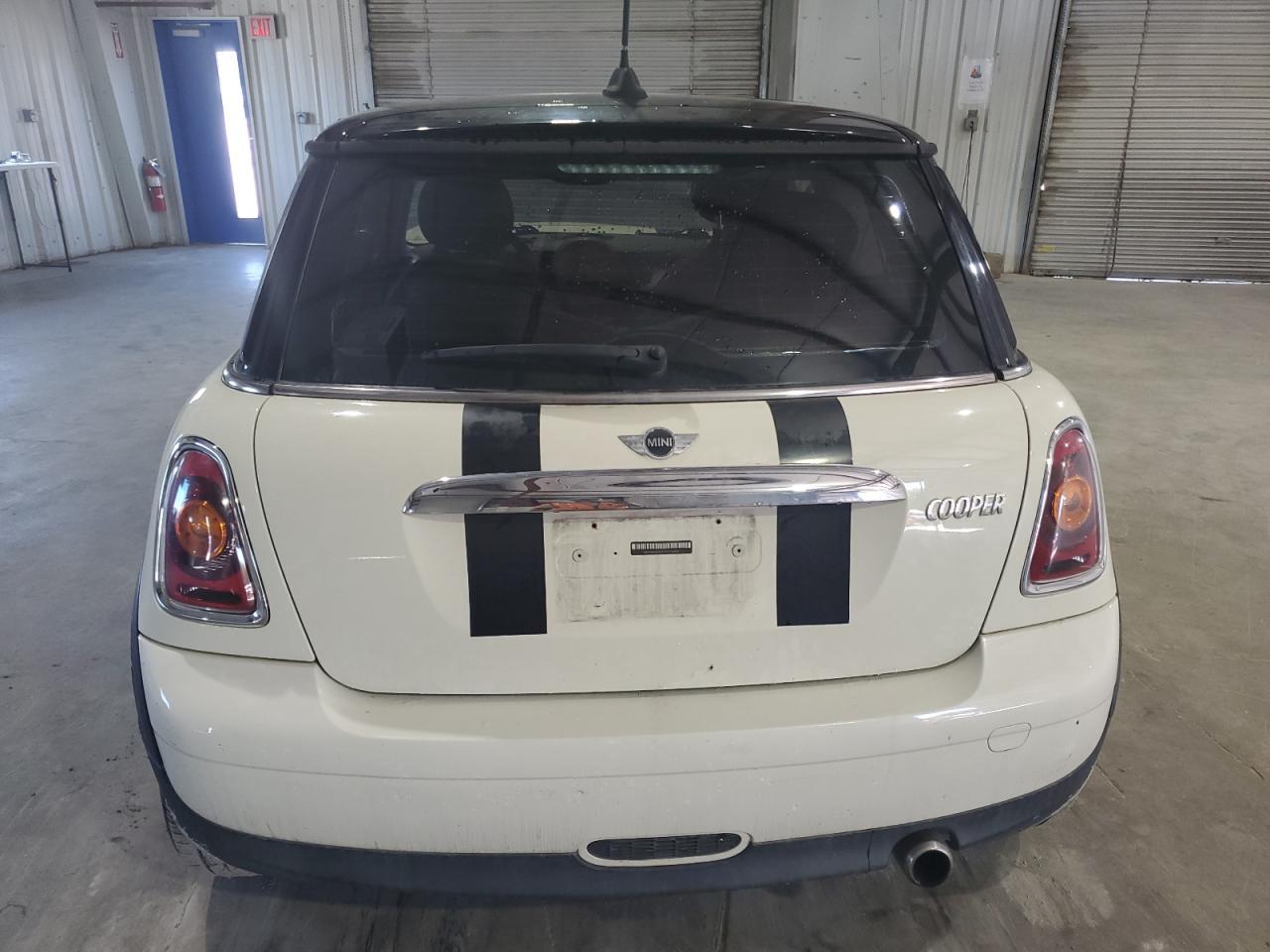 2009 Mini Cooper VIN: WMWMF33529TT68312 Lot: 64485334