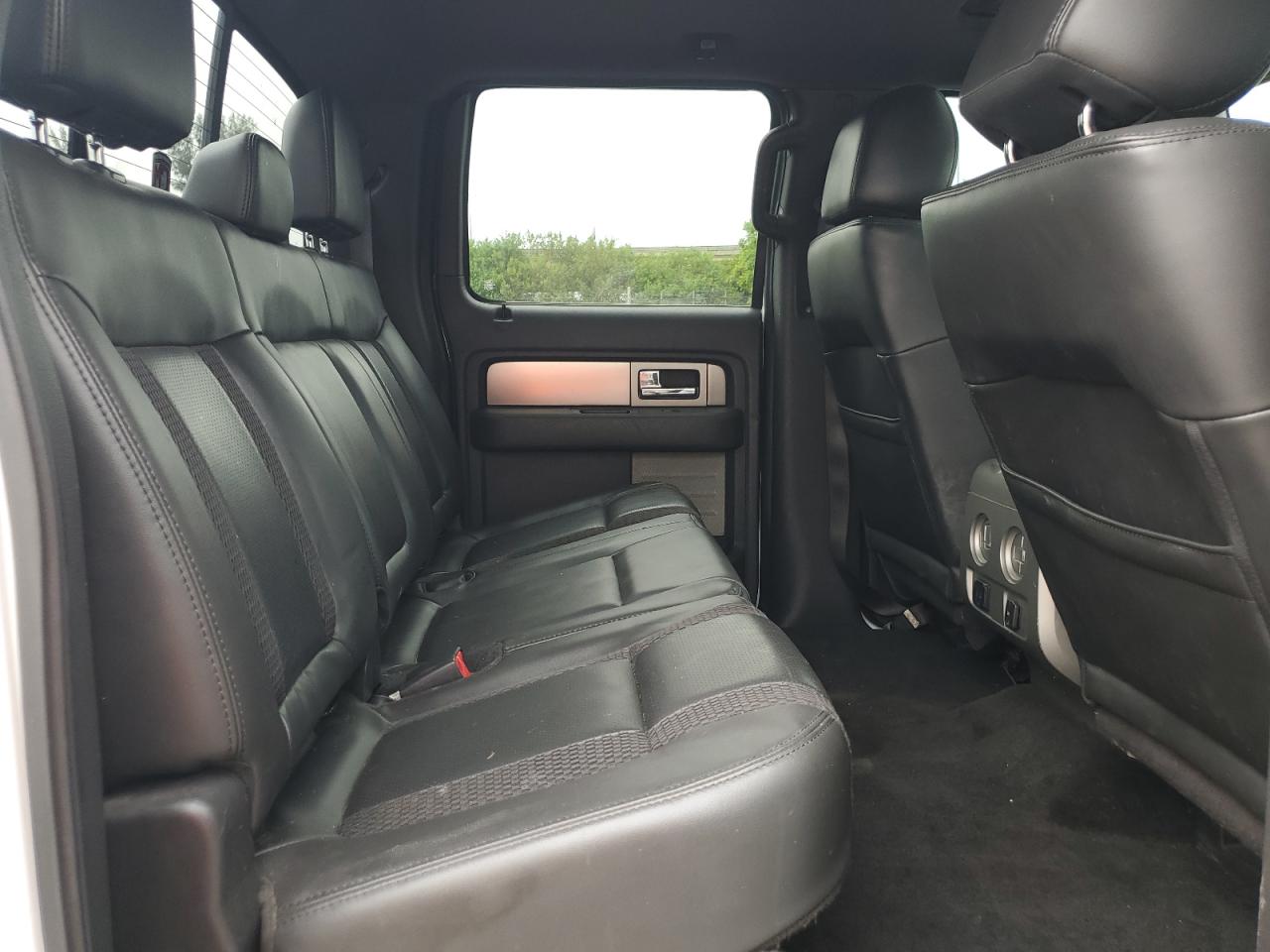 2013 Ford F150 Svt Raptor VIN: 1FTFW1R61DFB09897 Lot: 62761954