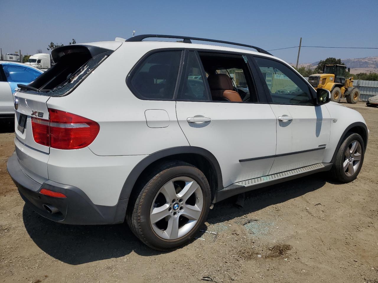 5UXFF0C55ALT77518 BMW X5 2010. Фото: 2