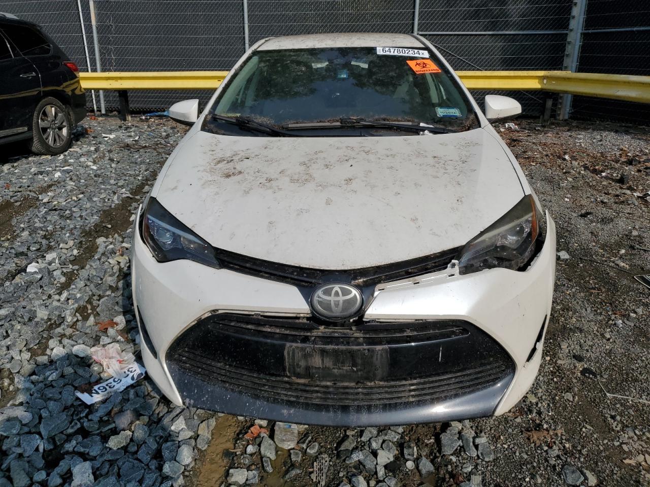 2017 Toyota Corolla L VIN: 5YFBURHE9HP675400 Lot: 64780234