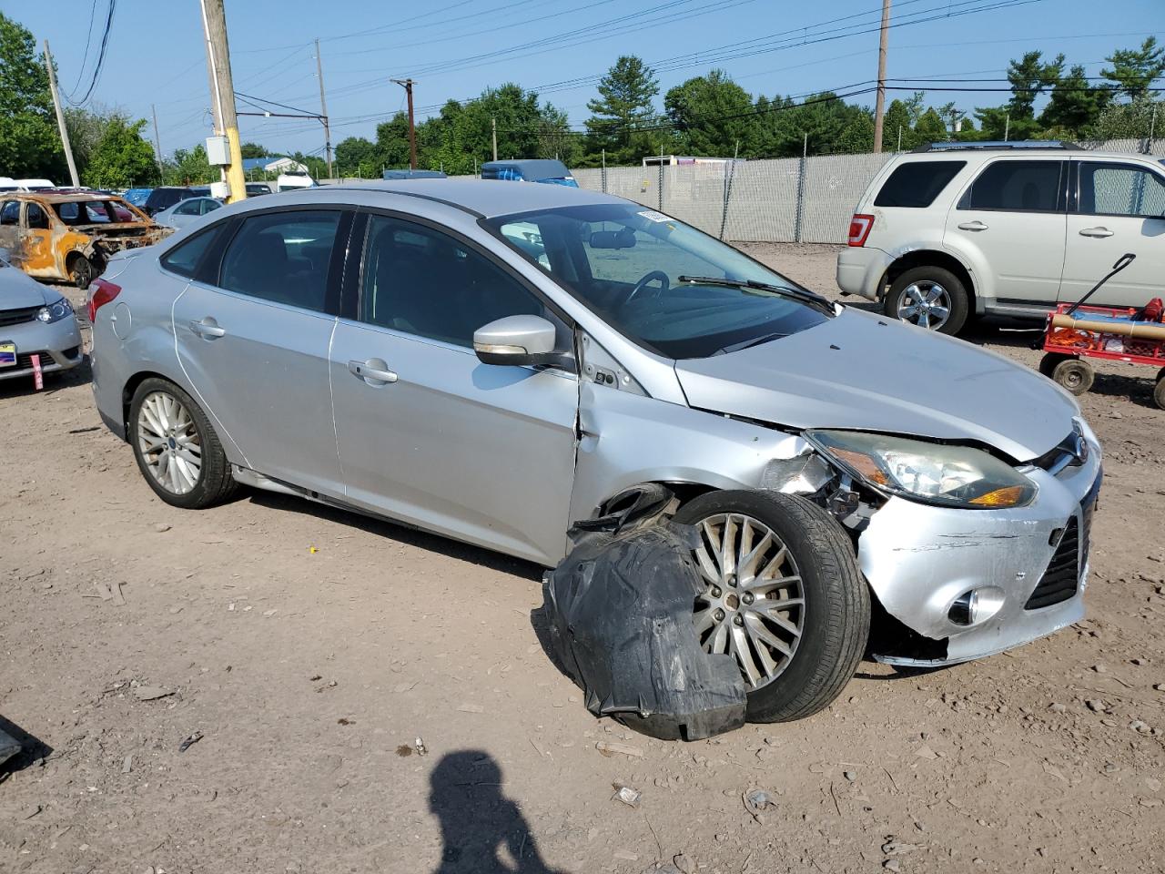 2013 Ford Focus Titanium VIN: 1FADP3J20DL120468 Lot: 62668874