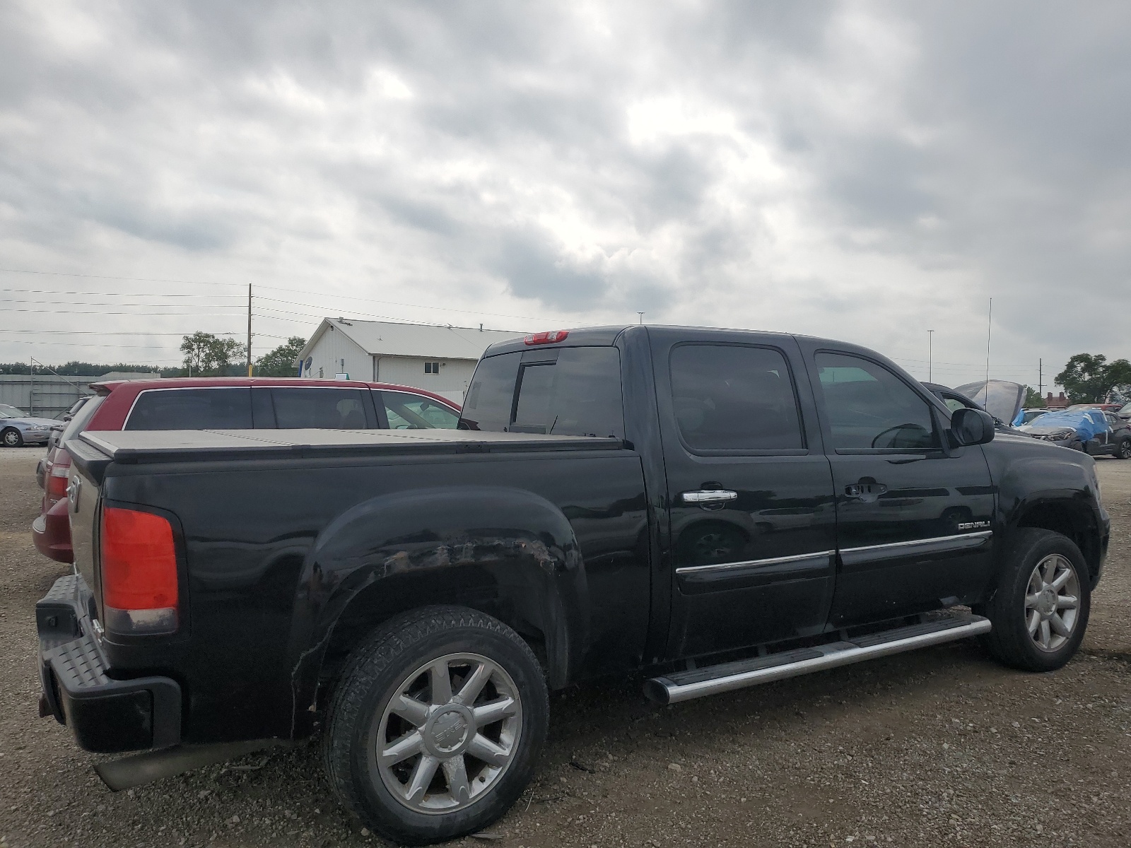 2013 GMC Sierra K1500 Denali vin: 3GTP2XE26DG160364