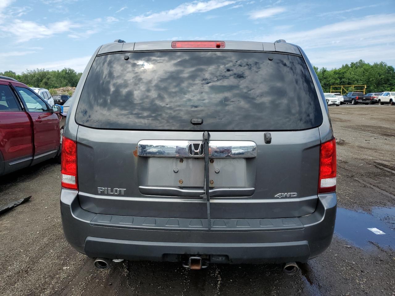 2011 Honda Pilot Exl VIN: 5FNYF4H60BB043890 Lot: 63419894