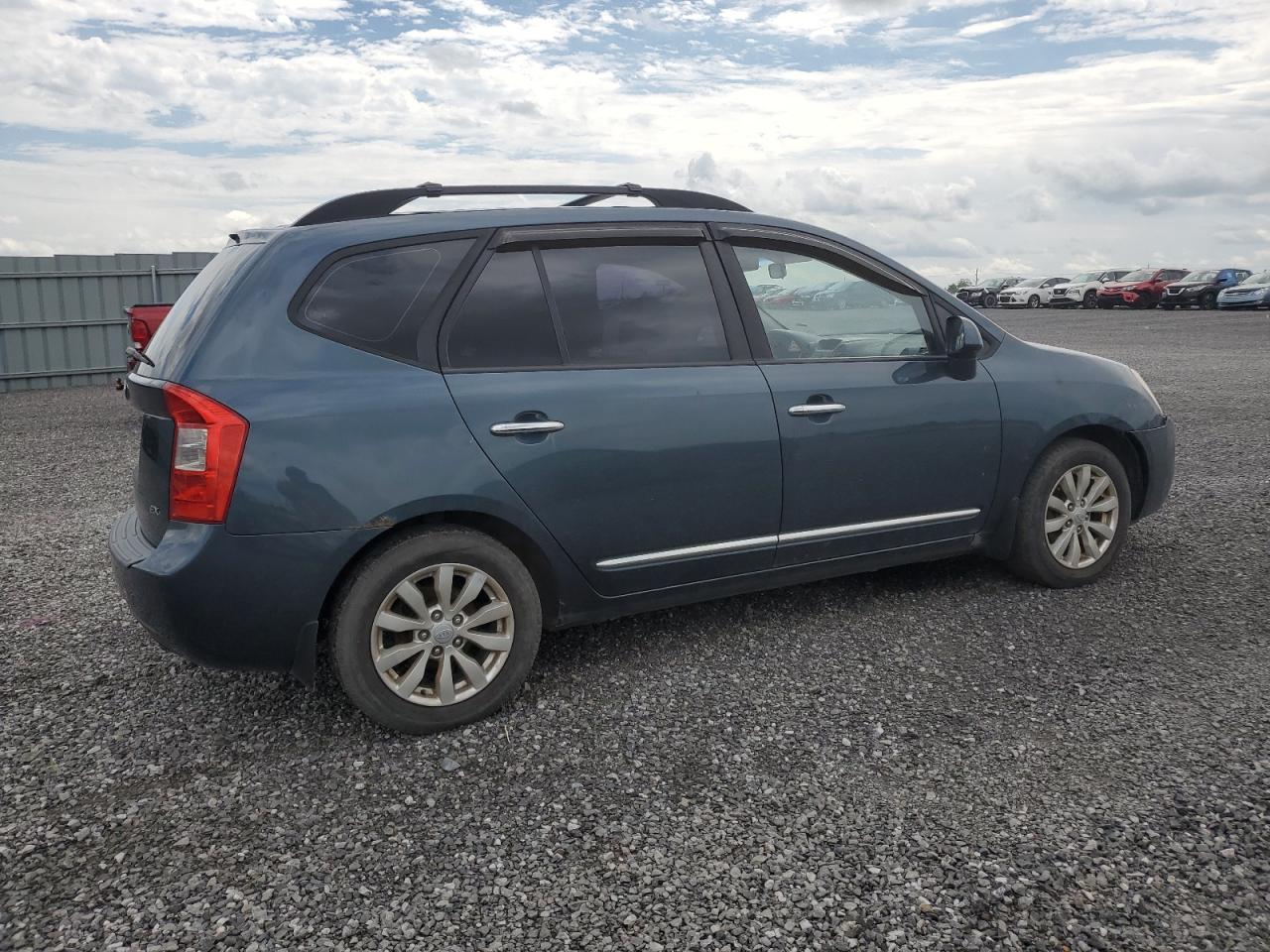 2009 Kia Rondo Base VIN: KNAFG528197293253 Lot: 63606024
