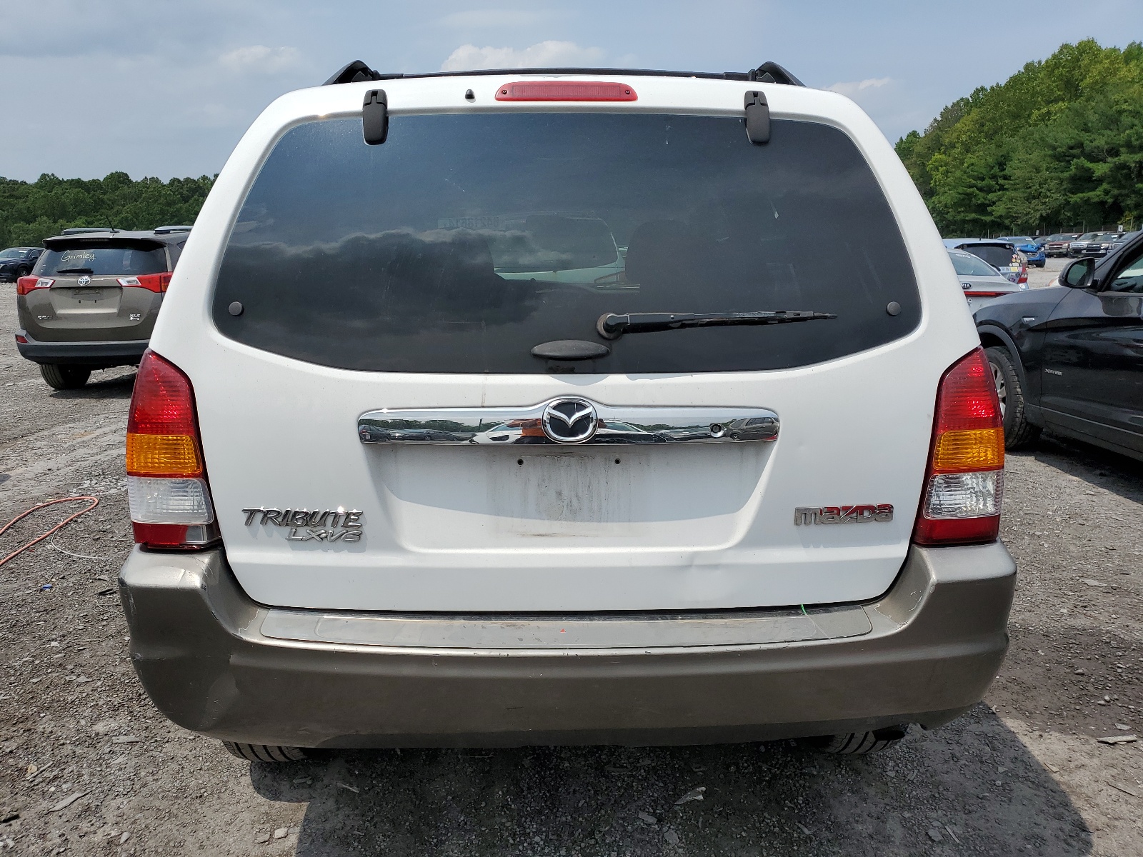 4F2YU09142KM12464 2002 Mazda Tribute Lx