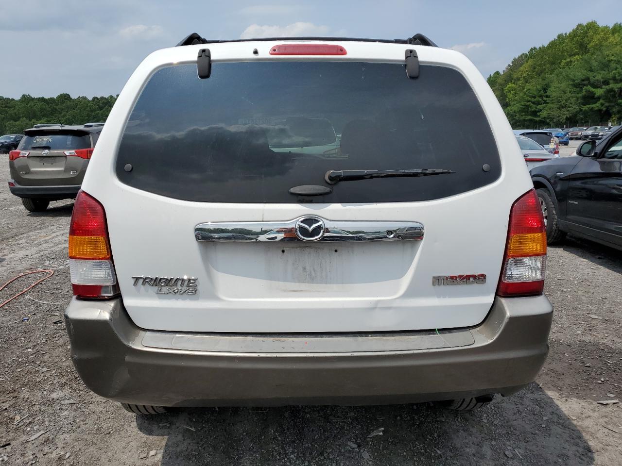 2002 Mazda Tribute Lx VIN: 4F2YU09142KM12464 Lot: 64218614