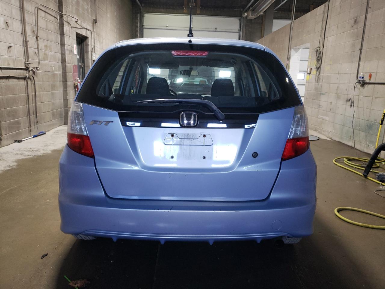 2009 Honda Fit VIN: JHMGE88279S034506 Lot: 69627574