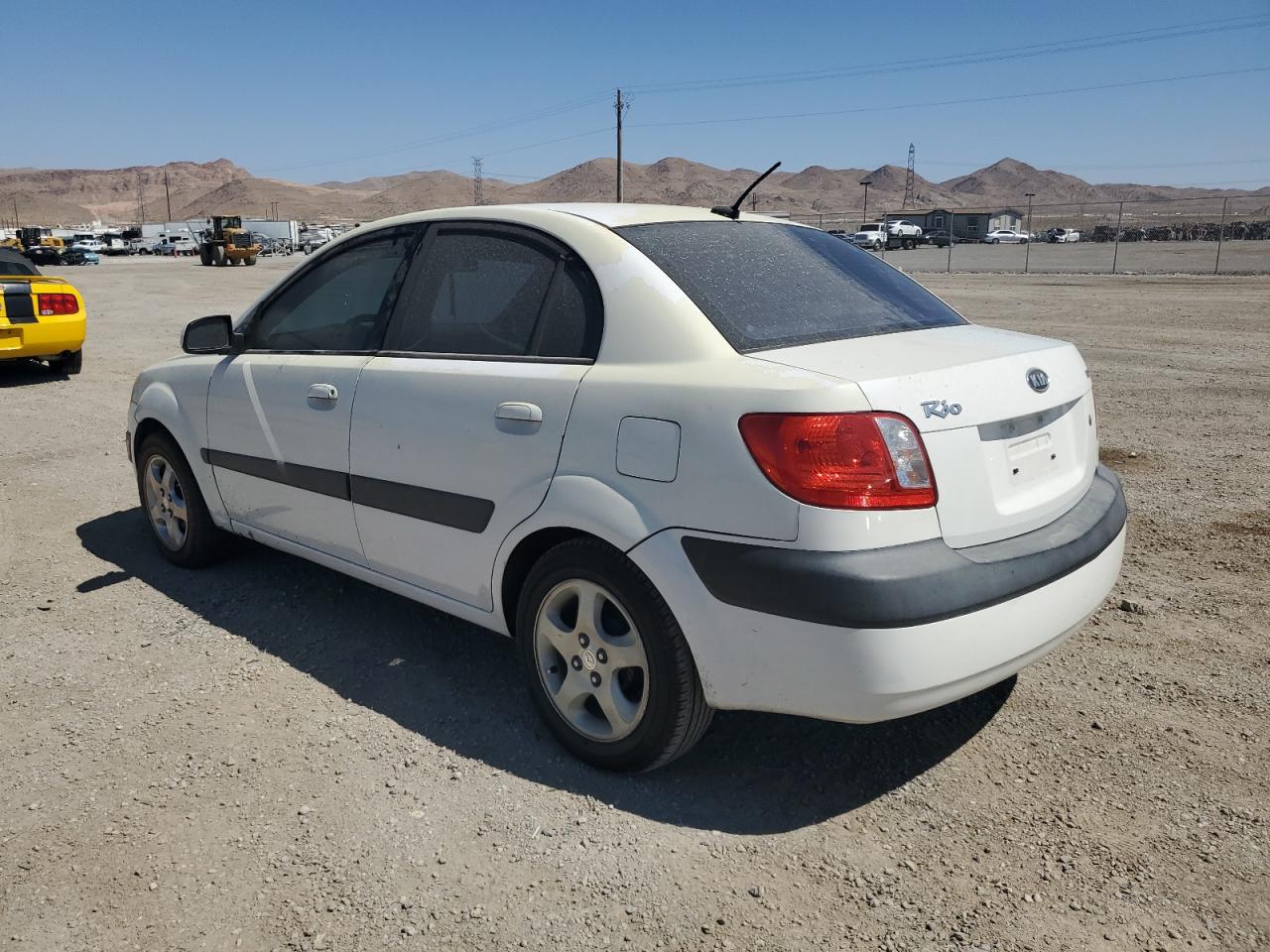 2009 Kia Rio Base VIN: KNADE223796504784 Lot: 65604974