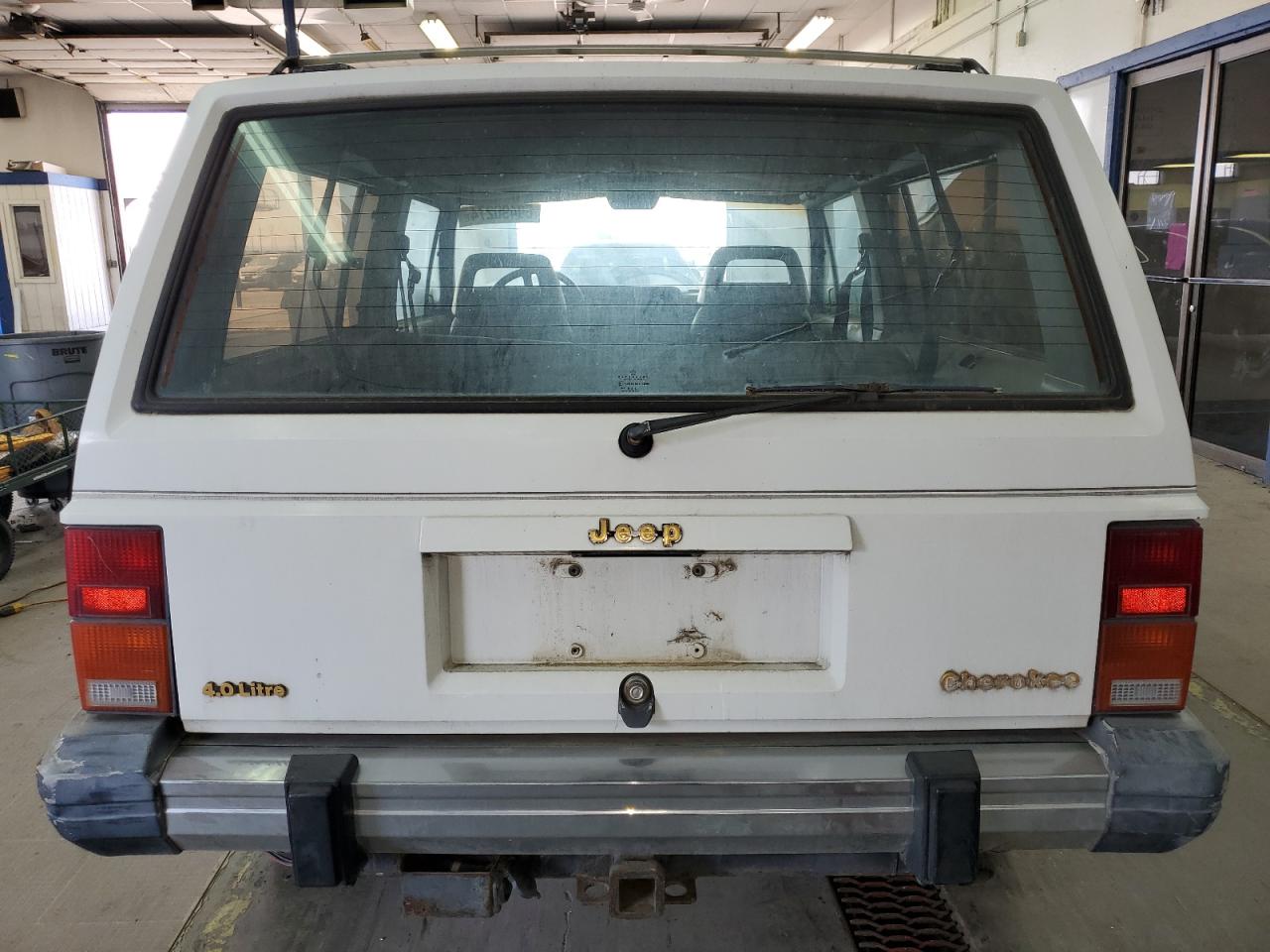 1990 Jeep Cherokee Laredo VIN: 1J4FJ57L1LL166898 Lot: 60490274